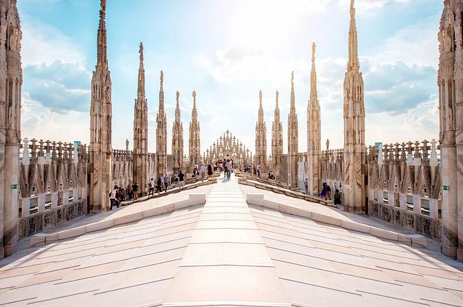 The marble walkway of the Duomo's central terrace lined with spires